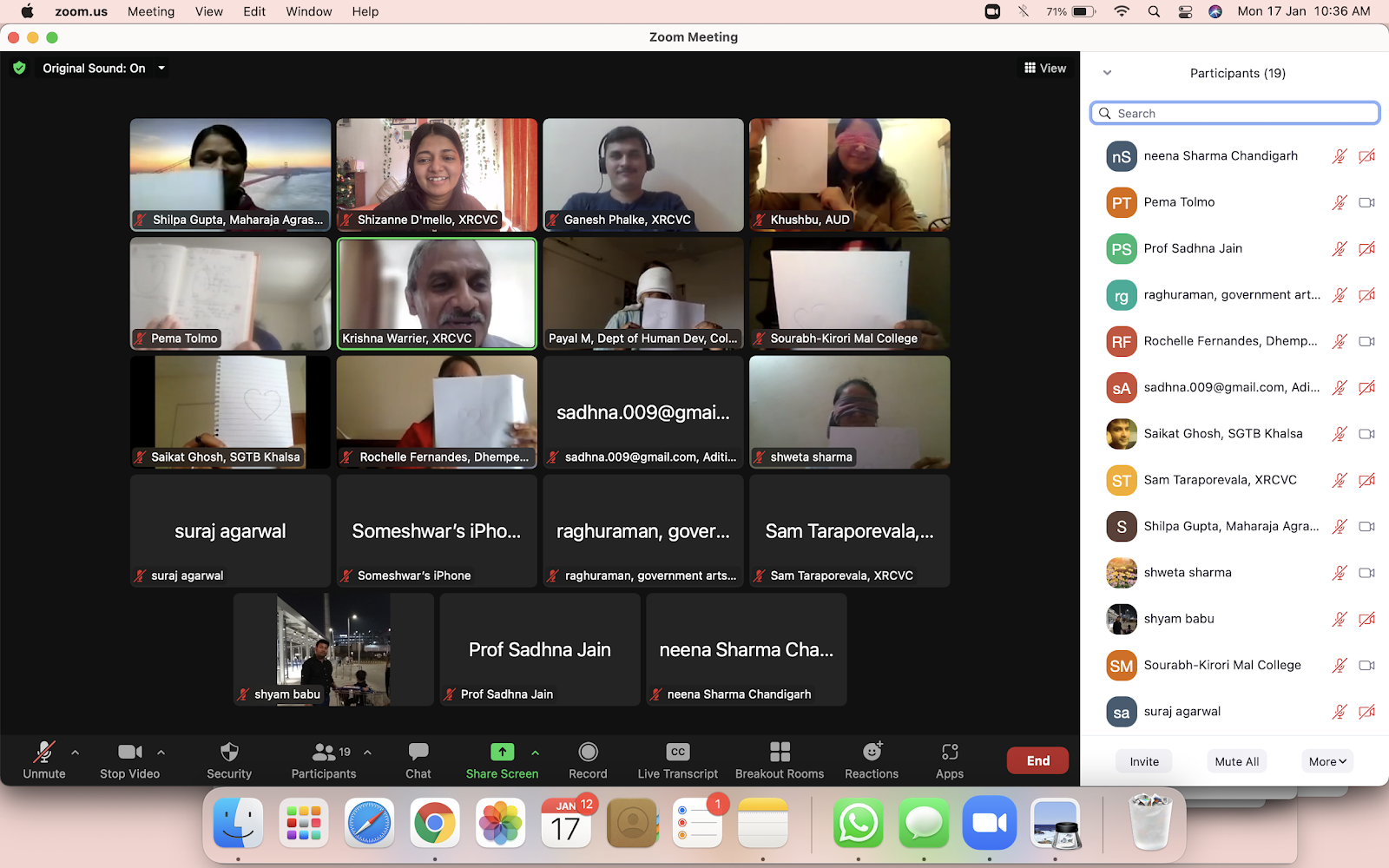 A screenshot of participants holding up notepads, and sheets of paper before the camera, to share their drawings of a shape whilst wearing a blindfold over a zoom call.