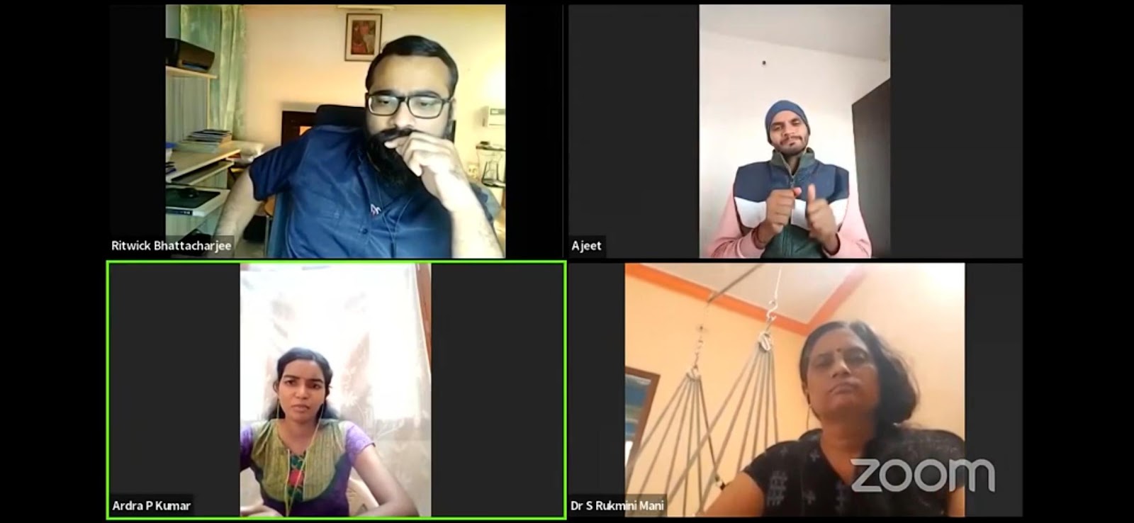 A grid of four video call participants: Ritwick Bhattacharjee, Ajeet (signing), Ardra P Kumar, and Dr. S Rukmani Mani, each in their individual frame.