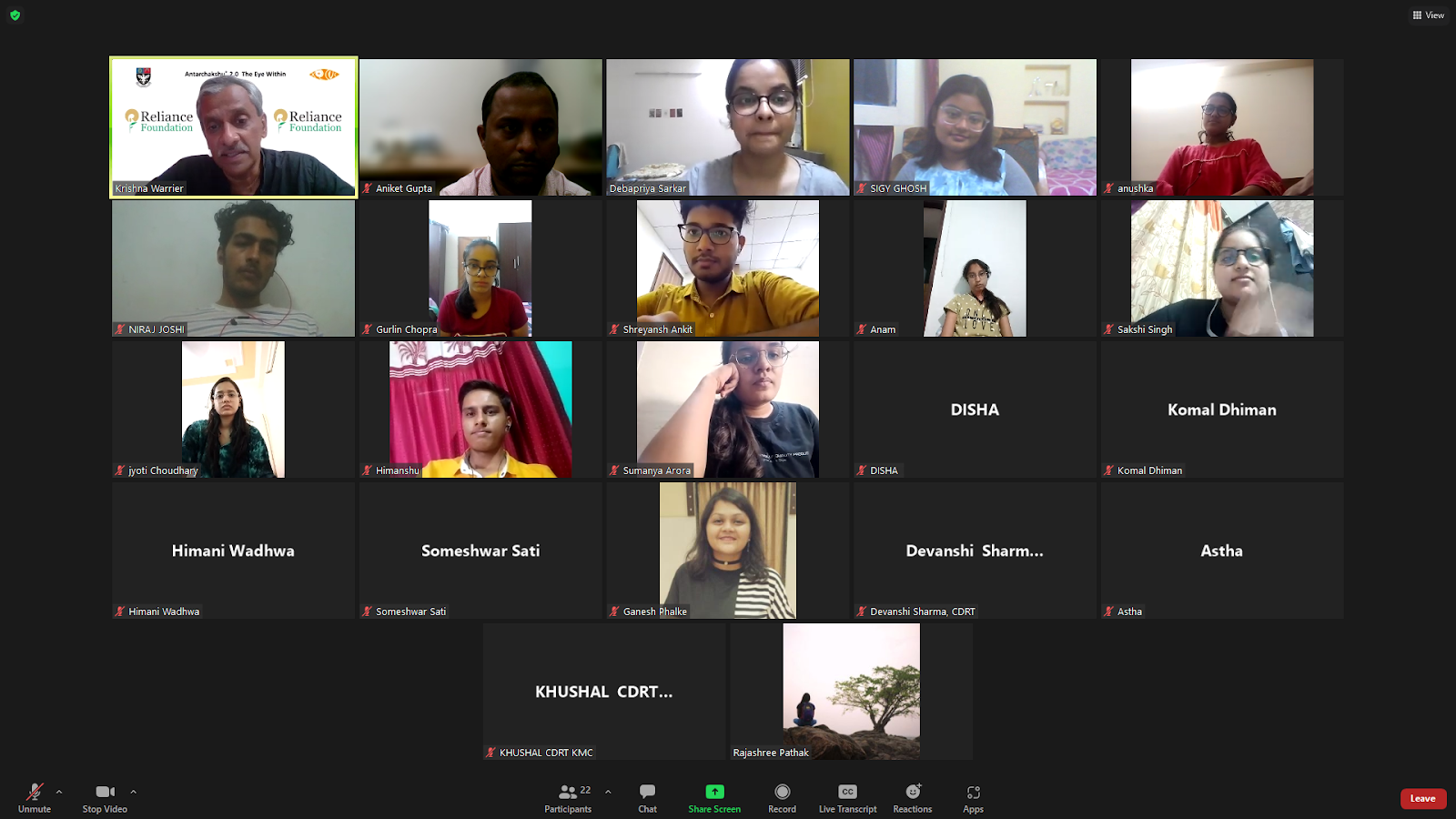 A screenshot of a Zoom meeting with multiple participants in a grid layout. The top left features a speaker with the Reliance Foundation logo, indicating an online conference or lecture.