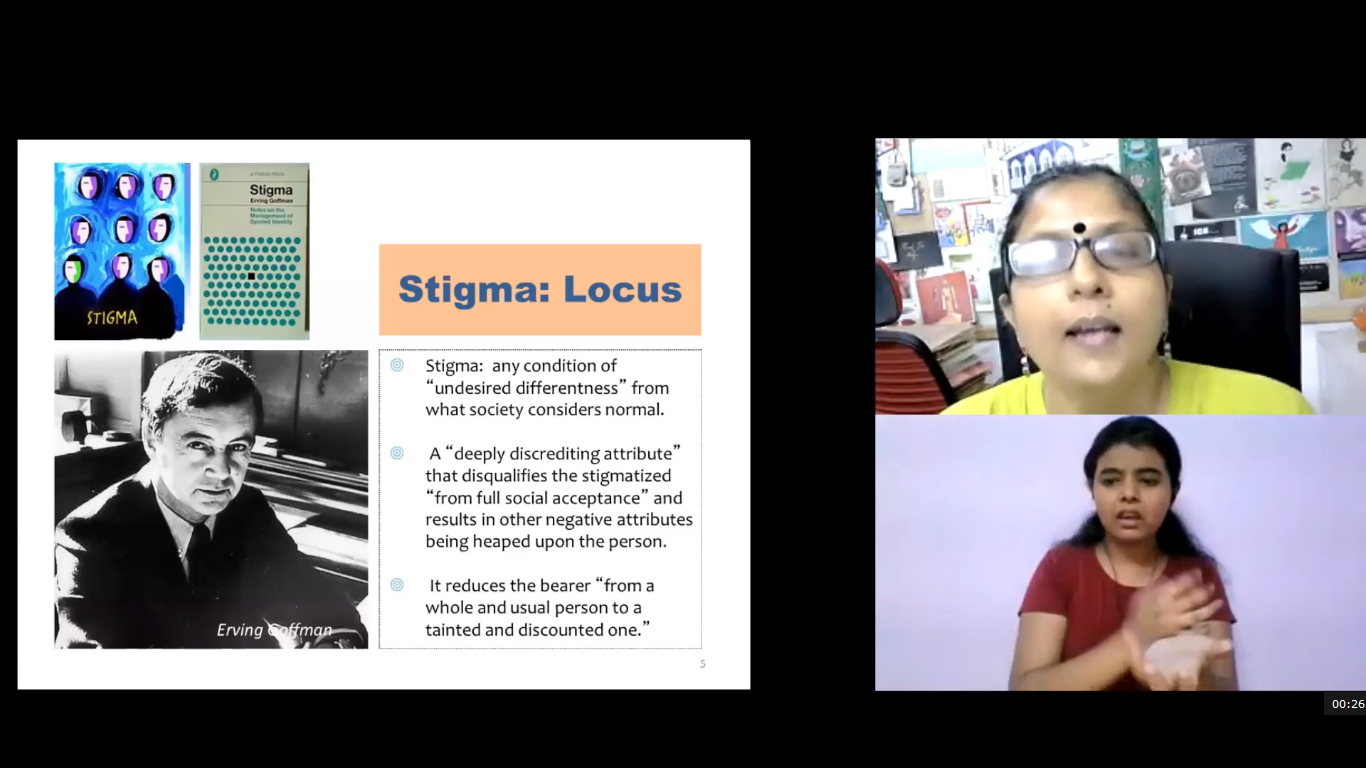 A presentation slide titled "Stigma: Locus" defines stigma and includes images of Ernst Goffman and abstract art. Two video call participants are on the right, one speaking and one signing.